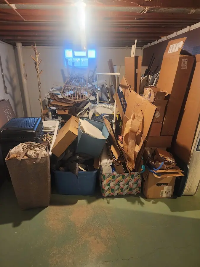 Roll-off dumpster container at job site for 20 Yard Dumpster Rental in Ellington